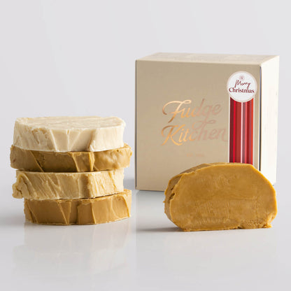 Fudge Kitchen Caramel and Cream Fudge Selection presented in a buff gift box and Happy Christmas decorative seal