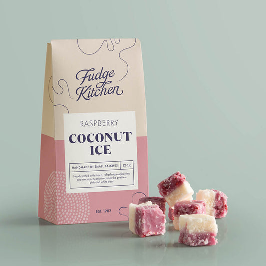 Raspberry Coconut Ice in its pack with beautifully layered pink and white pieces of coconut ice displayed beside it.