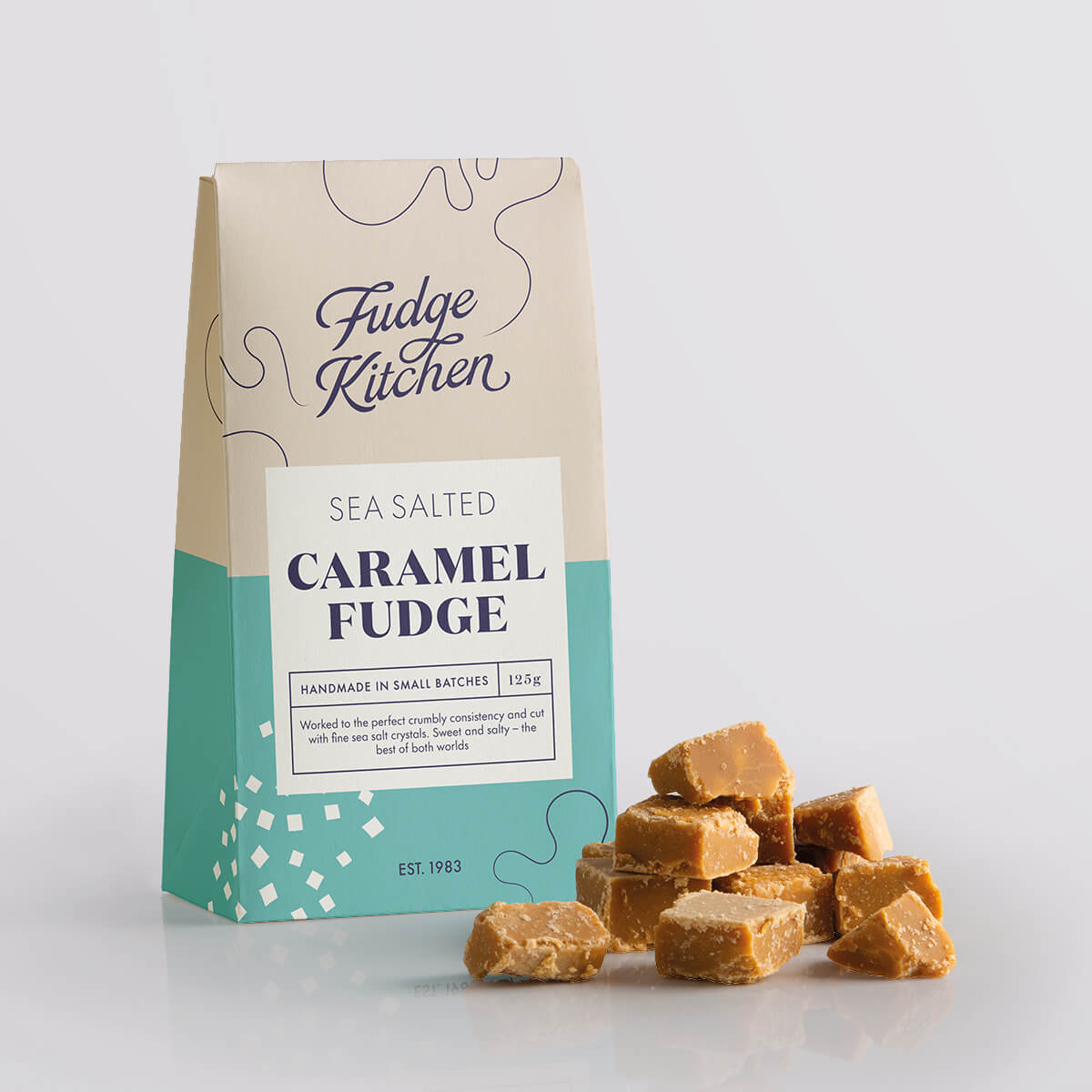 Taste the balance of sweet and salty with Sea Salted Caramel Fudge. Buttery, crumbly fudge with sea salt crystals for a rich, melt-in-your-mouth experience.