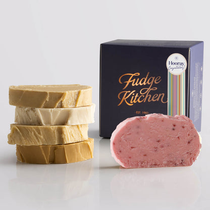 Toffee fudge and fruit fudge selection presented in an indigo gift box and Congratulations decorative seal.