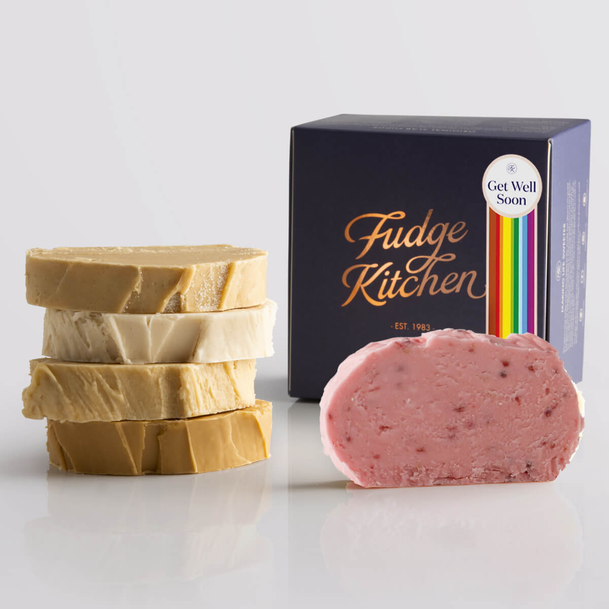 Toffee fudge and fruit fudge selection presented in an indigo gift box and Get Well Soon decorative seal.