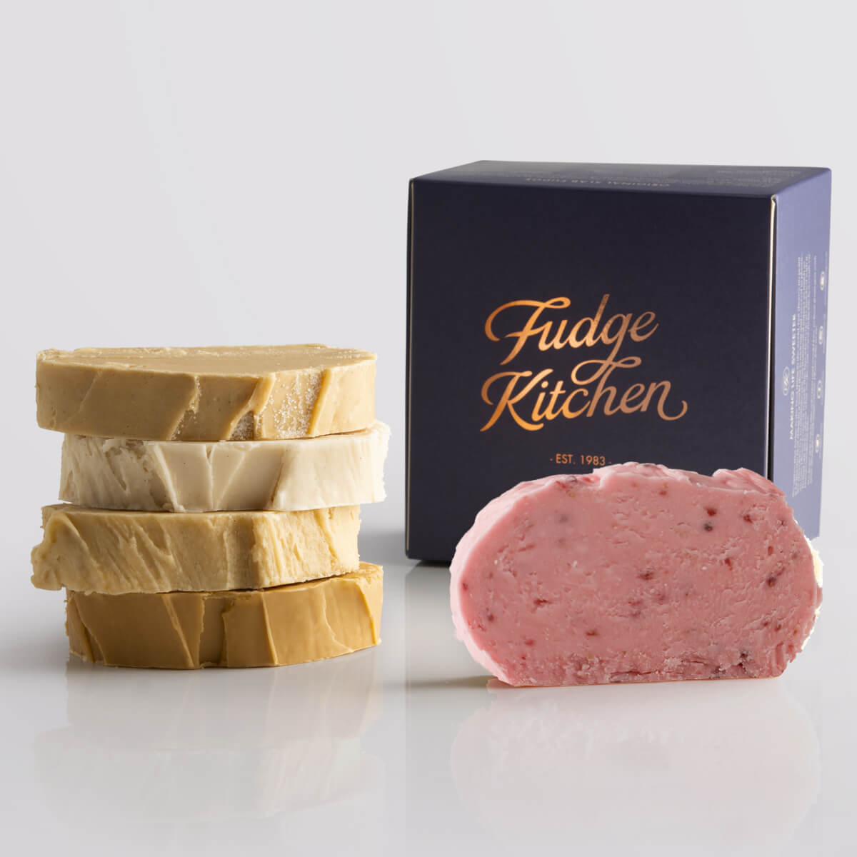 Caramel fudge and fruit fudge selection with a gilded gift box in indigo - Fudge Kitchen fresh fudge selection.