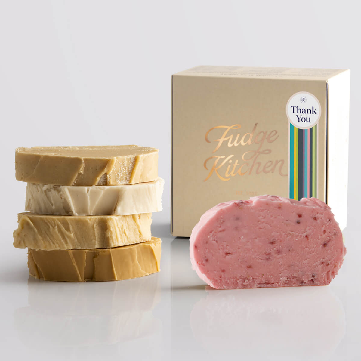 Toffee fudge and fruit fudge selection presented in a buff gift box and Thank You decorative seal.