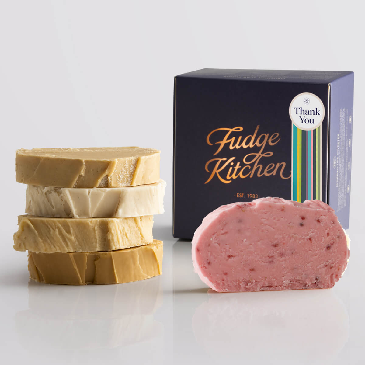 Toffee fudge and fruit fudge selection presented in an indigo gift box and Thank You decorative seal.