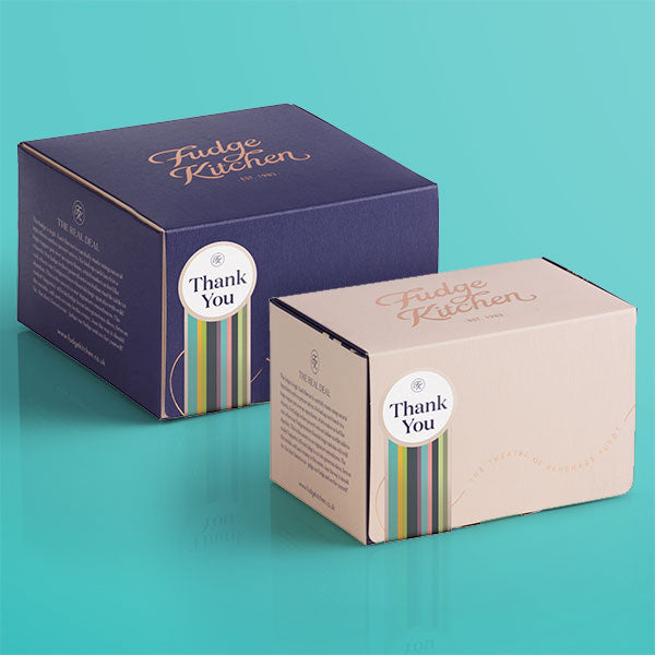 Elegant buff 3-slice and deep indigo 5-slice fudge boxes featuring a thoughtful 'Thank You' seal, ideal for expressing gratitude.