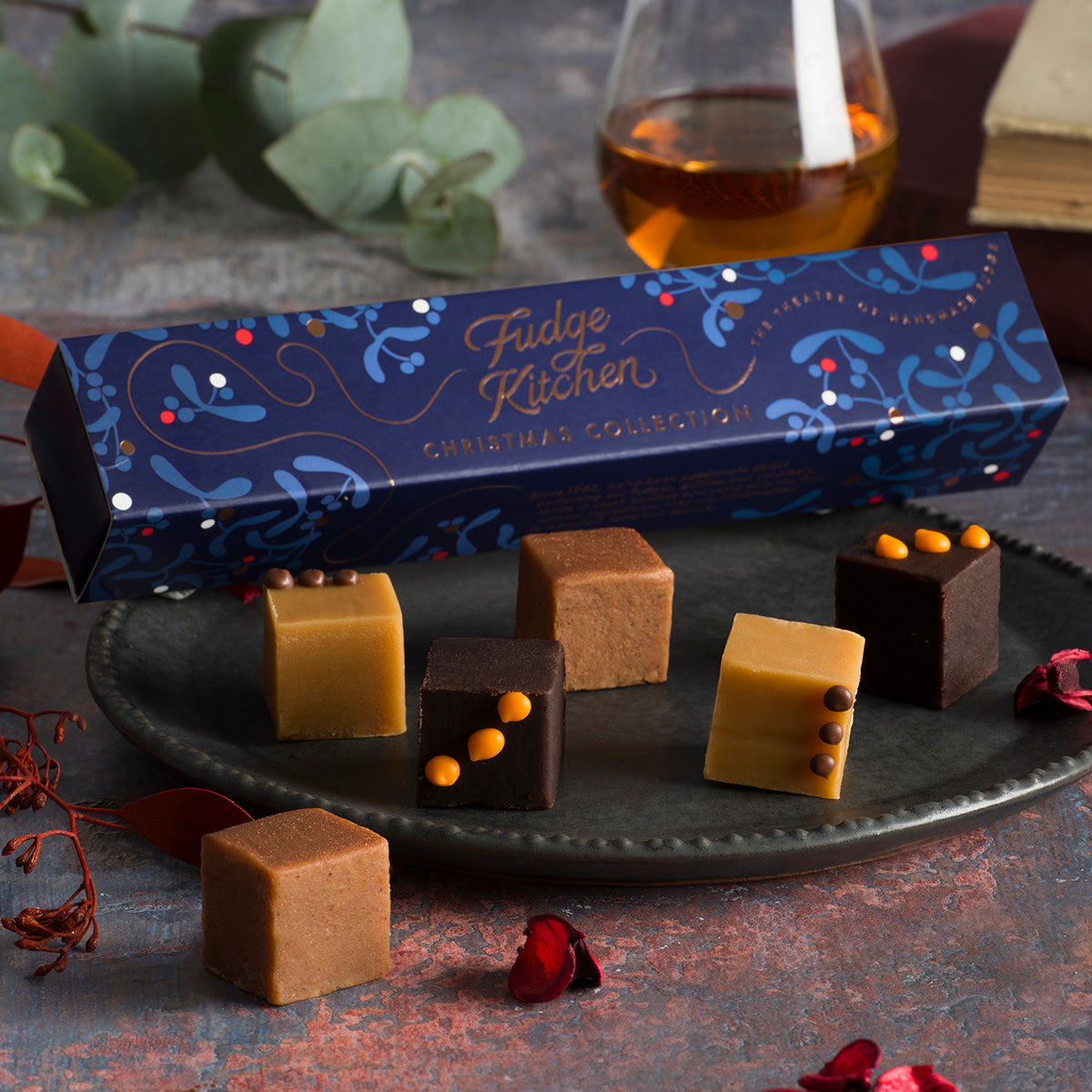 Handmade Christmas Fudge Slider Selection from Fudge Kitchen displayed on a plate, offering a variety of rich, indulgent fudge flavours perfect for Christmas gifts or festive celebrations. A luxurious treat for the holiday season.