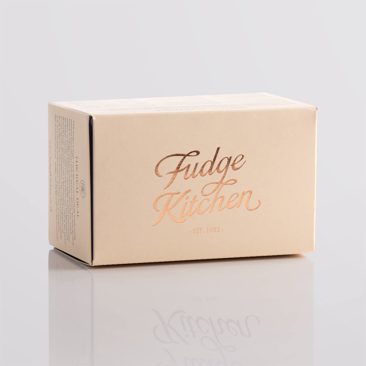 Elegant buff-coloured gift box with gilded accents, perfect for 3 slices of Fudge Kitchen handmade fudge.