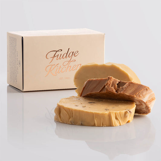 Classic fudge trio presented in an elegant buff-coloured gift box with gilded accents.