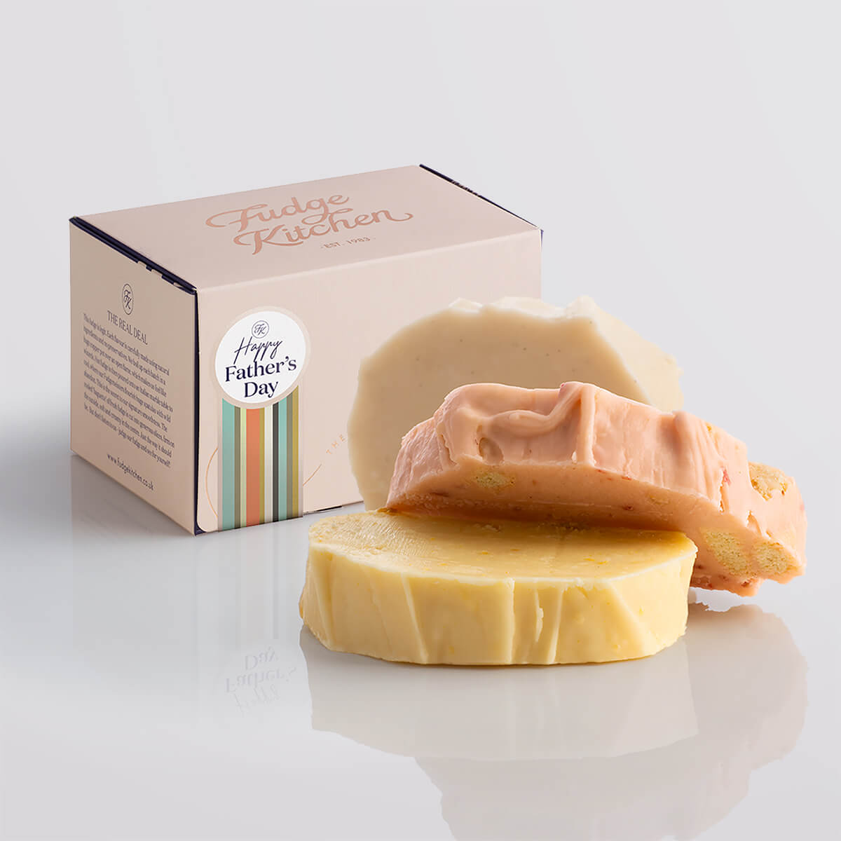 Fruity fudge trio elegantly packaged in a buff-coloured gift box with gilded accents and a 'Happy Father's Day' box seal.