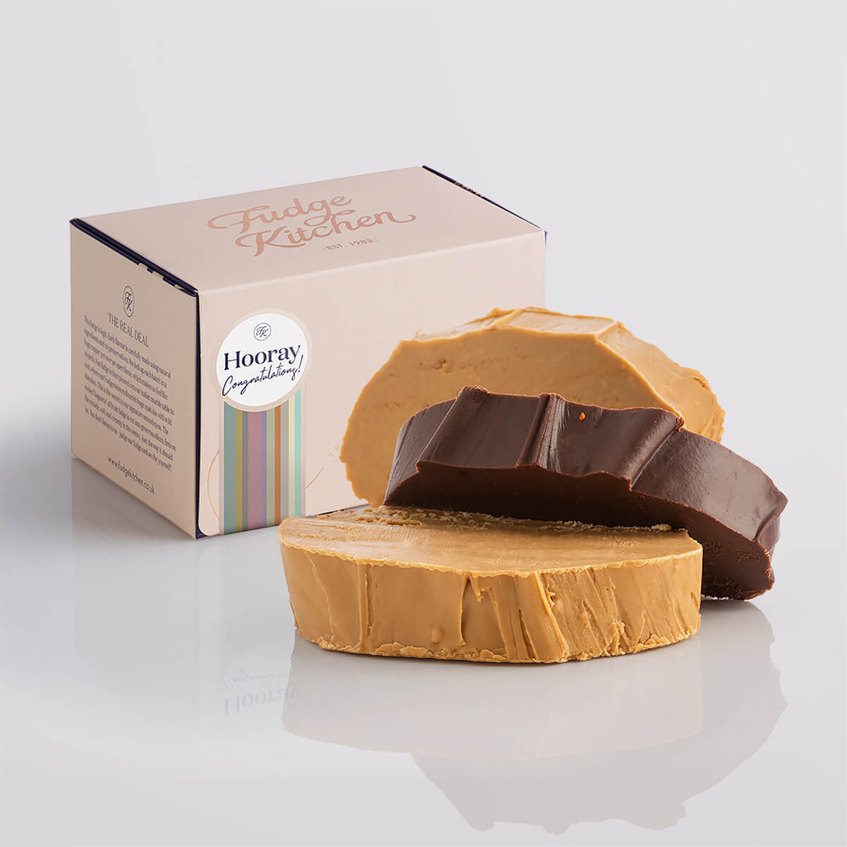 Vegan fudge trio elegantly displayed in a buff-coloured gift box with gilded accents with a 'Congratulations' box seal.