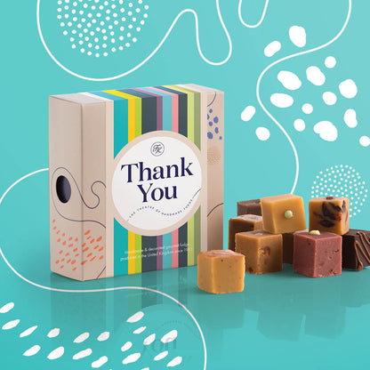 Fudge Kitchen Afternoon Tea Fudge Selection, elegantly presented in a box with nine delicious fudge pieces shown, with a Thank You sleeve. Includes a variety of afternoon tea-inspired flavours, perfect for gifting or indulging.