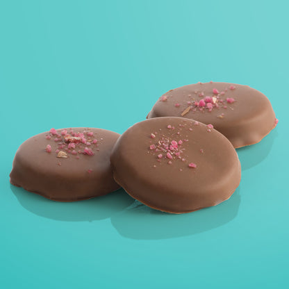 Close-up of Rose Infused Caramels by Fudge Kitchen, highlighting the smooth, firm texture and delicate rose flavour of these handmade caramels. A sophisticated treat for floral flavour enthusiasts.