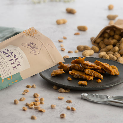 Peanut Brittle Pouch by Fudge Kitchen, served as a sweet and crunchy snack in a cosy setting. Perfect for sharing or gifting to peanut lovers on special occasions.