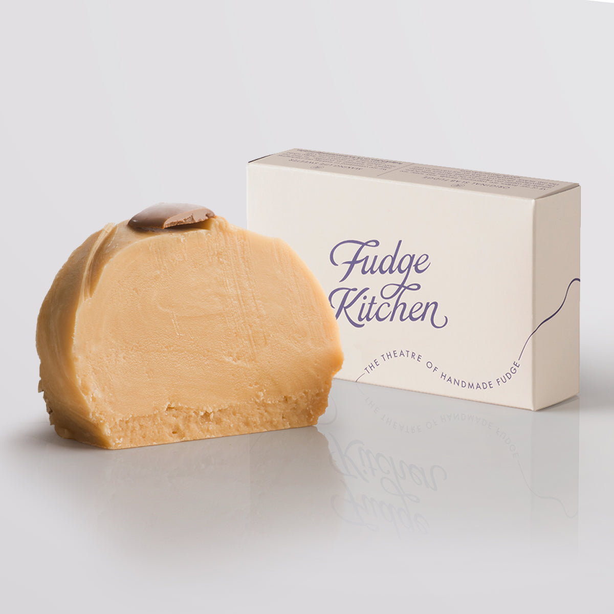 Irish Cream Fudge single slice, a Fudge Kitchen indulgent, handmade fudge flavour displayed with an elegant gift box.