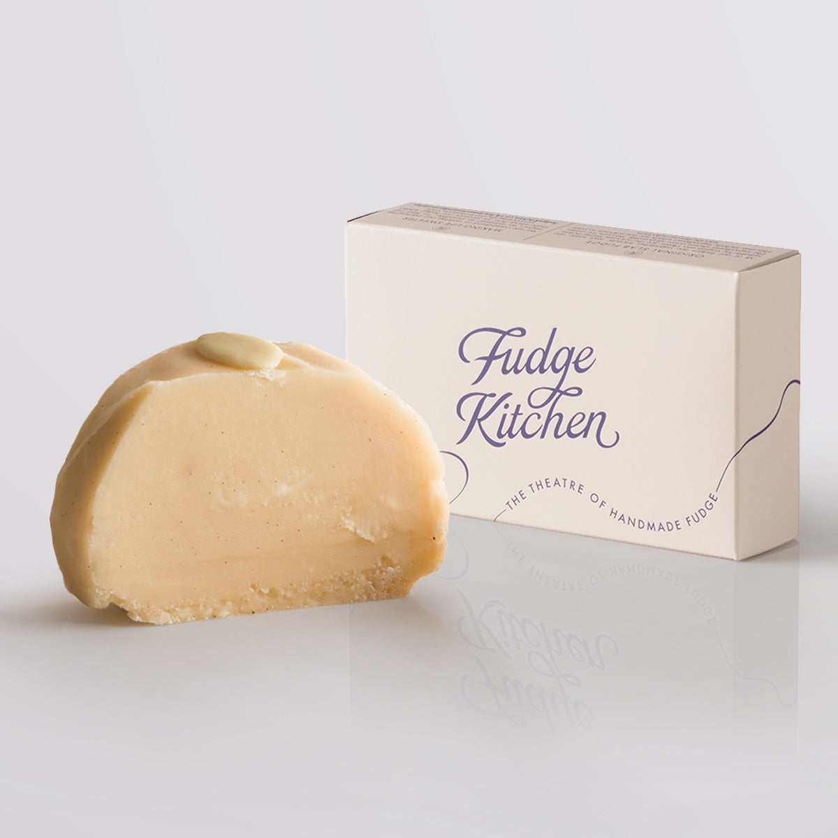 White Chocolate Fudge single slice, a Fudge Kitchen indulgent, handmade fudge flavour displayed with an elegant gift box.