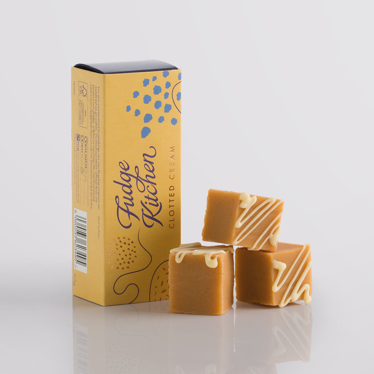 Elegant packaging of the Clotted Cream Fudge Trio Slider from Fudge Kitchen, designed to beautifully present three rich, handmade clotted cream fudge flavours. Ideal for gifting or as a premium dessert for fudge lovers.